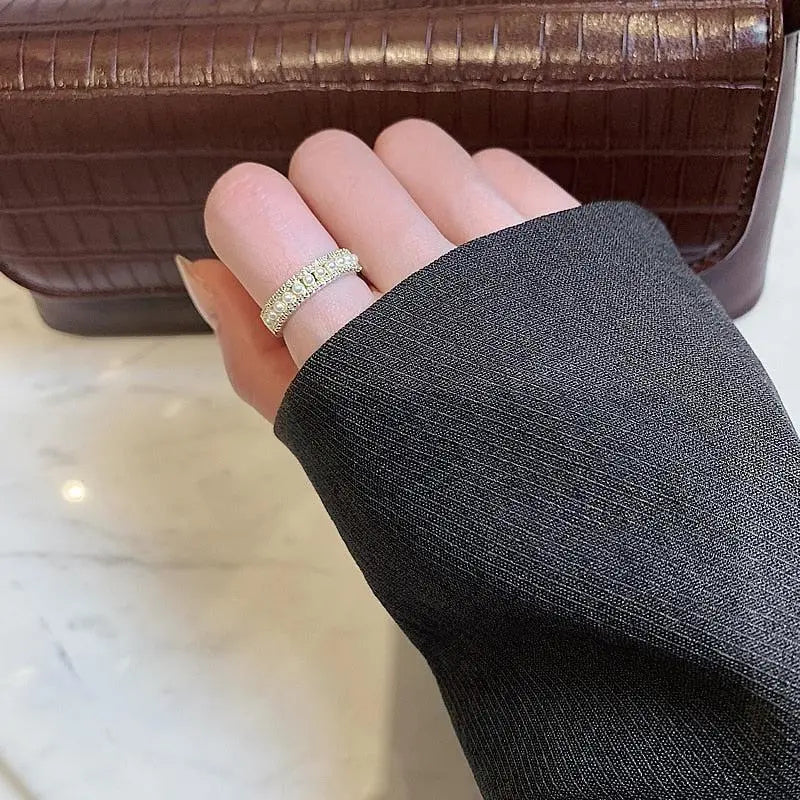 Luksusring lavet af guld og perler