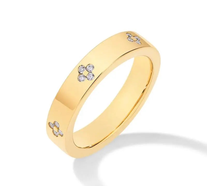Elegant guldring med diamantdetaljer