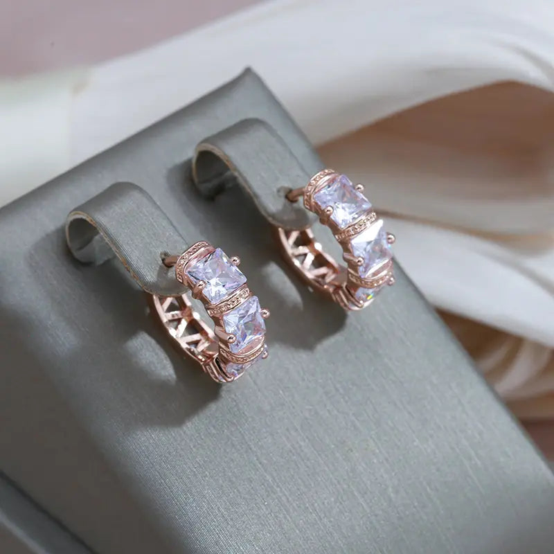Elegante øreringe indlagt med gyldne krystaller