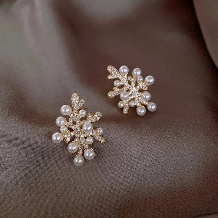 Elegante koralperleøreringe