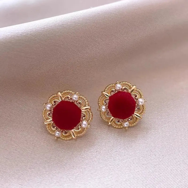 Elegante runde øreringe i rosaguld