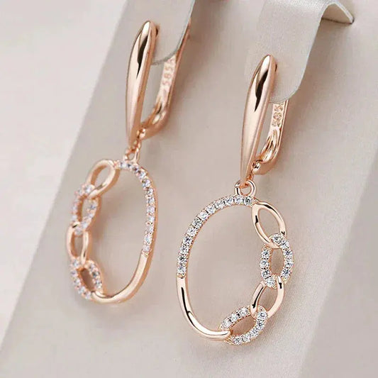 Elegante øreringe med guld zirconia