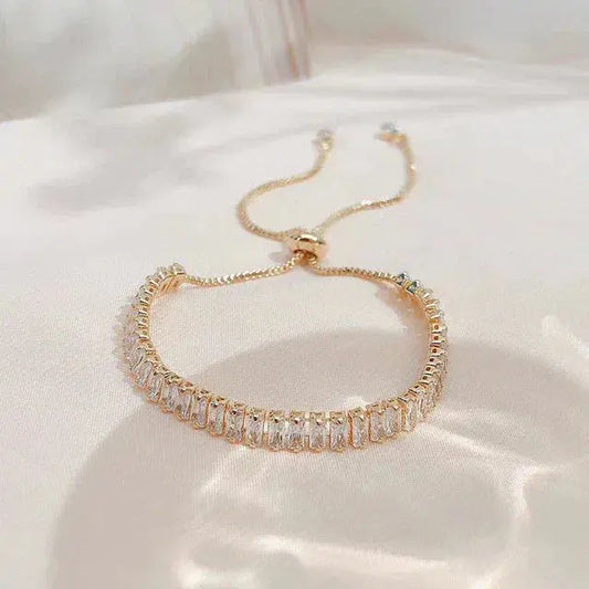 Justerbar armbånd i cubic zirconia i guld og sølv