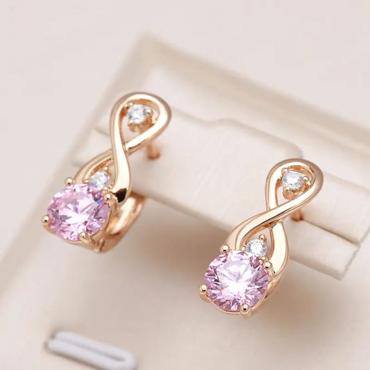 Elegante øreringe lavet af pink zirkon