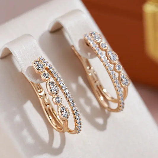 Elegante øreringe med zirkonia lavet af guld