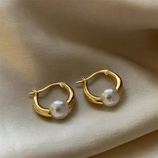 Elegant guld perle øreringe