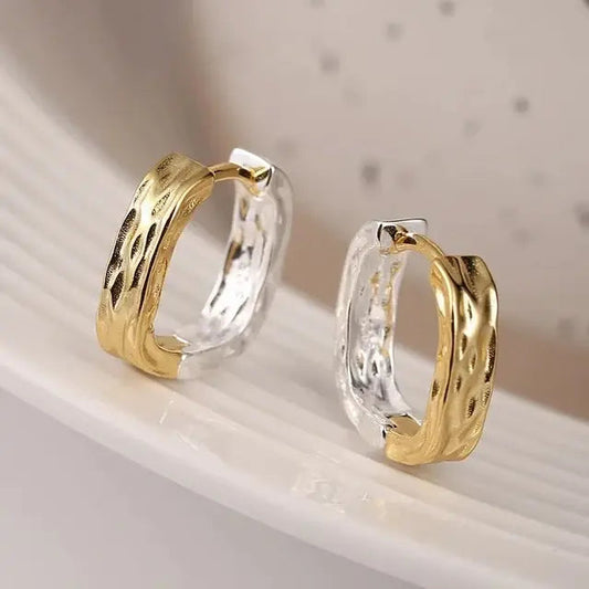 Elegante øreringe i guld og hvid