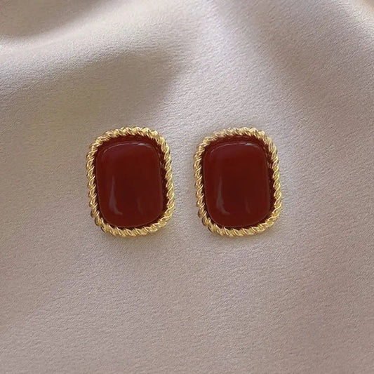 Elegant rød-guld øreringe